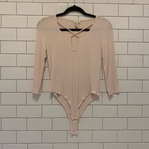 Forever 21 bodysuit. No tags, but never worn.